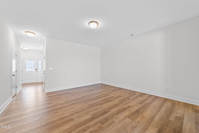 149 E Porthaven Way, Clayton, NC 27527 - empty room featuring baseboards and light wood-style floors