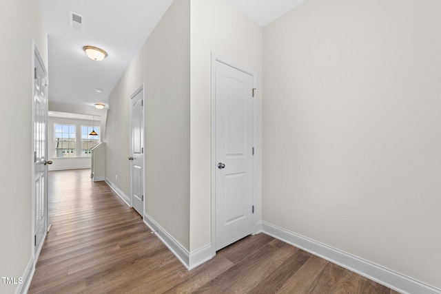149 E Porthaven Way, Clayton, NC 27527 - corridor with baseboards, dark wood finished floors, and visible vents