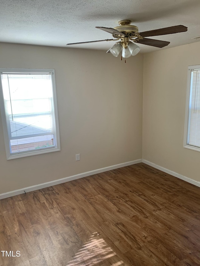 904 Marvin St, Goldsboro, NC 27530 - unfurnished room featuring wood finished floors, a ceiling fan, and baseboards