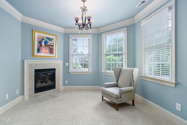 living area featuring crown molding, a chandelier, a high end fireplace, carpet floors, and baseboards