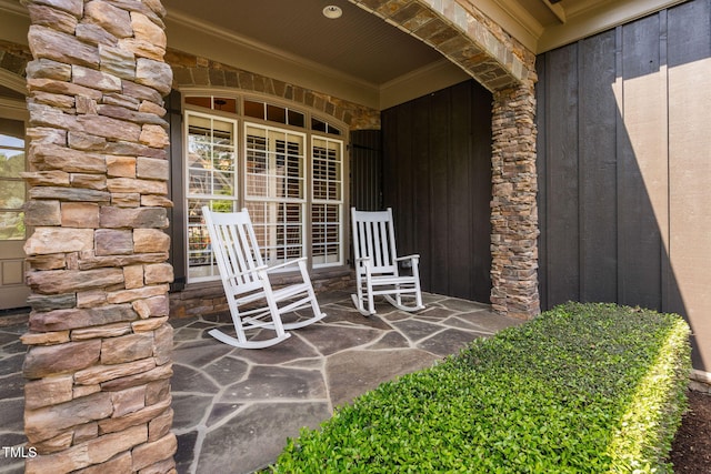 view of patio featuring a porch