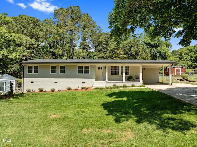 5208 Melbourne Rd, Raleigh, NC 27606 - ranch-style home with crawl space, driveway, a front yard, and a carport