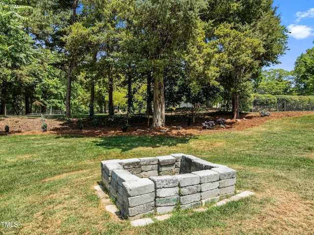 5208 Melbourne Rd, Raleigh, NC 27606 - view of yard featuring a fire pit