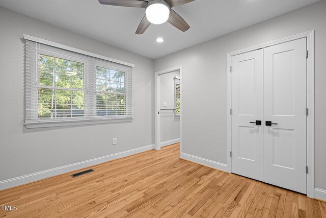 5208 Melbourne Rd, Raleigh, NC 27606 - unfurnished bedroom featuring baseboards, light wood finished floors, recessed lighting, a closet, and ceiling fan