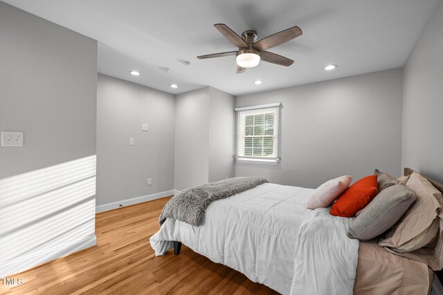 5208 Melbourne Rd, Raleigh, NC 27606 - bedroom with recessed lighting, light wood-style flooring, a ceiling fan, and baseboards