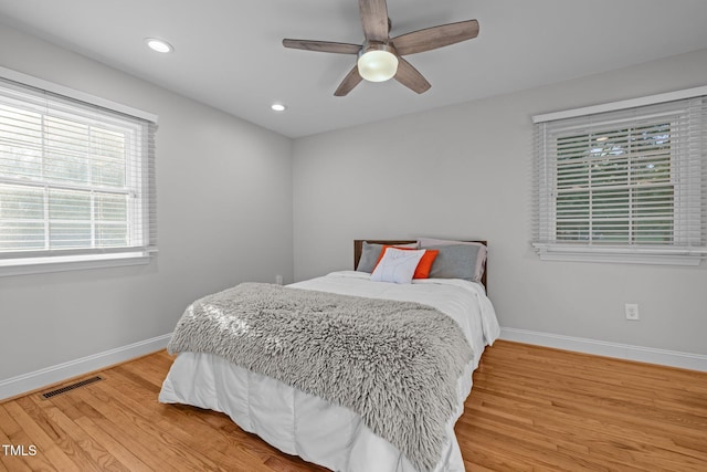 5208 Melbourne Rd, Raleigh, NC 27606 - bedroom featuring baseboards, light wood-type flooring, recessed lighting, and ceiling fan