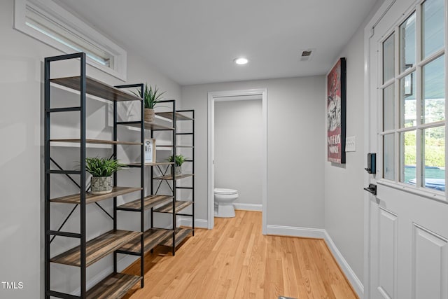5208 Melbourne Rd, Raleigh, NC 27606 - hall featuring baseboards, light wood finished floors, and recessed lighting