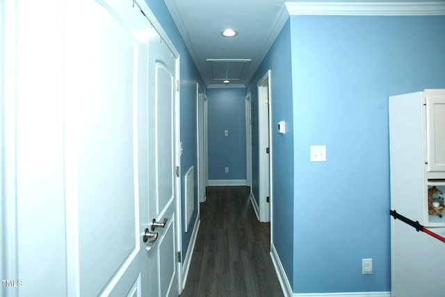 corridor featuring attic access, dark wood finished floors, baseboards, and recessed lighting