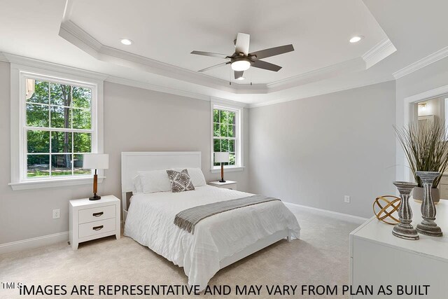 1412 Sagamore Dr, Louisburg, NC 27549 - bedroom featuring a ceiling fan, crown molding, baseboards, a raised ceiling, and light colored carpet