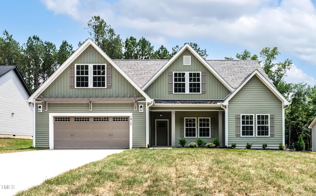 1412 Sagamore Dr, Louisburg, NC 27549 - view of front of property with board and batten siding, a shingled roof, driveway, and a front yard