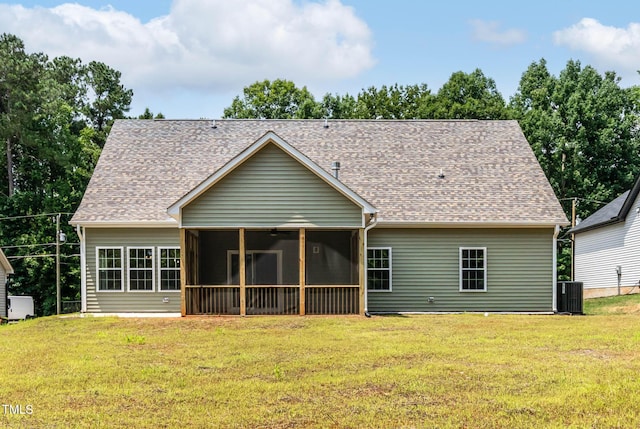 1412 Sagamore Dr, Louisburg, NC 27549 - back of house featuring a yard, roof with shingles, and a sunroom