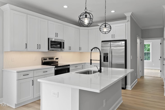 1412 Sagamore Dr, Louisburg, NC 27549 - kitchen with stainless steel appliances, ornamental molding, decorative light fixtures, light wood finished floors, and decorative backsplash