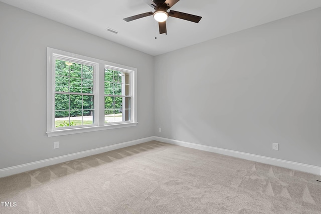 1412 Sagamore Dr, Louisburg, NC 27549 - unfurnished room featuring light colored carpet, a ceiling fan, and plenty of natural light