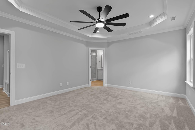 1412 Sagamore Dr, Louisburg, NC 27549 - empty room with a tray ceiling, light colored carpet, ornamental molding, ceiling fan, and recessed lighting