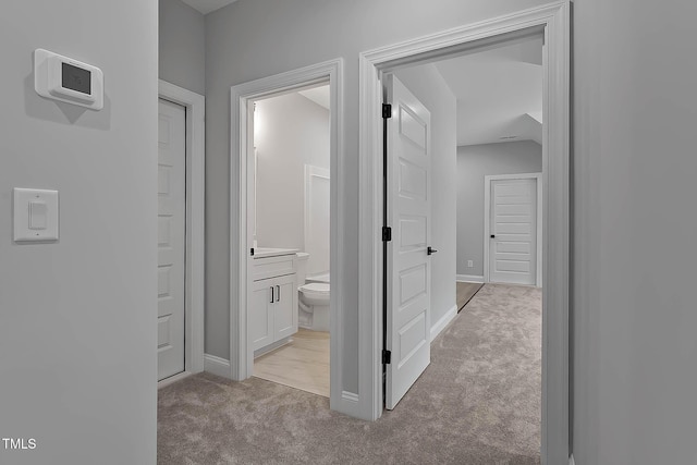 1412 Sagamore Dr, Louisburg, NC 27549 - corridor with light colored carpet and baseboards