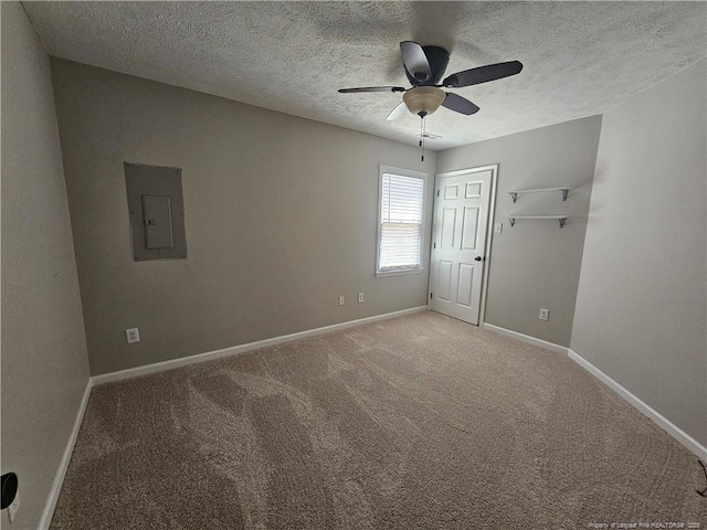 5472 Robmont Dr, Fayetteville, NC 28306 - unfurnished room featuring electric panel, a textured ceiling, baseboards, ceiling fan, and light carpet