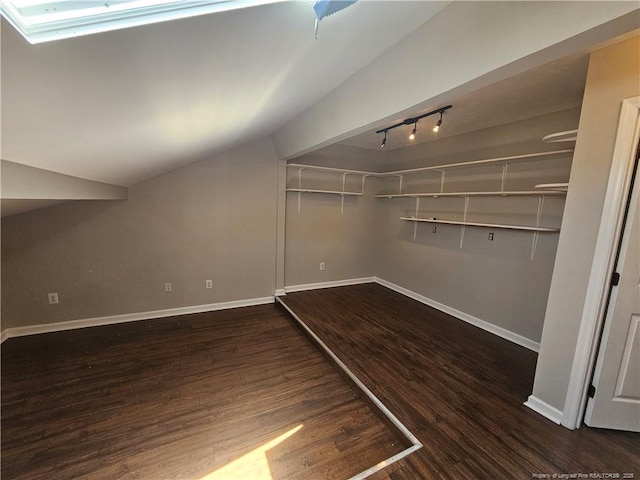 5472 Robmont Dr, Fayetteville, NC 28306 - walk in closet with lofted ceiling and wood finished floors