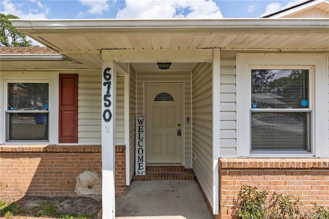 6750 Weeping Water Run, Fayetteville, NC 28314 - doorway to property with brick siding