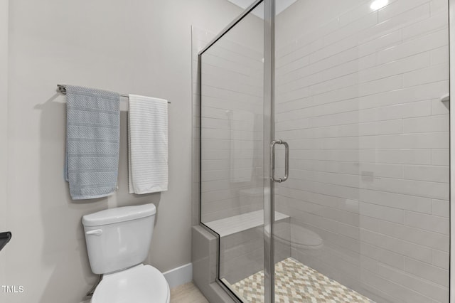 1229 Perry Bluff Dr, Wake Forest, NC 27587 - full bathroom with a shower stall, toilet, and baseboards