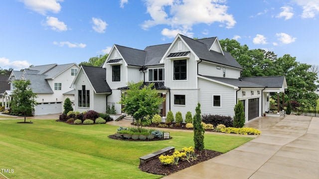 1229 Perry Bluff Dr, Wake Forest, NC 27587 - modern farmhouse style home with driveway, board and batten siding, a front lawn, an attached garage, and a standing seam roof