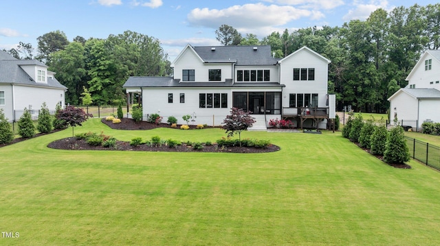 1229 Perry Bluff Dr, Wake Forest, NC 27587 - back of house featuring a sunroom and a shingled roof