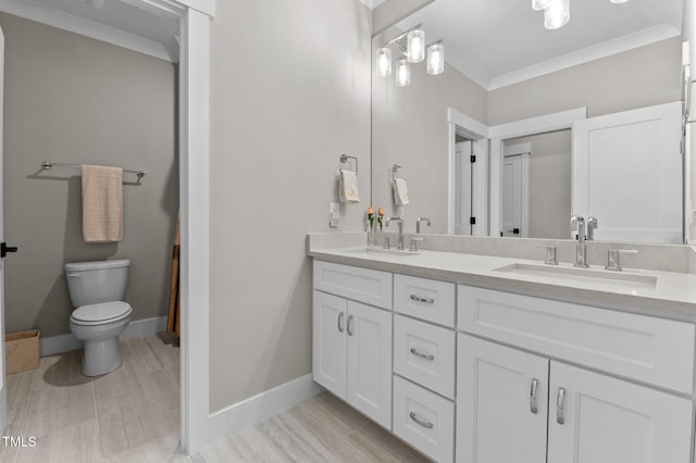 1229 Perry Bluff Dr, Wake Forest, NC 27587 - full bathroom with crown molding, toilet, double vanity, and baseboards