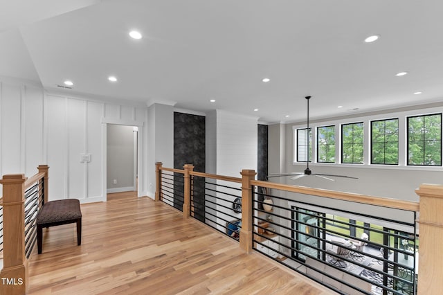 1229 Perry Bluff Dr, Wake Forest, NC 27587 - hall featuring an upstairs landing, crown molding, light wood-type flooring, and recessed lighting