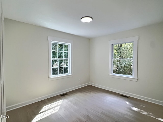 116 Lumpkin St, Raleigh, NC 27610 - unfurnished room featuring baseboards and wood finished floors