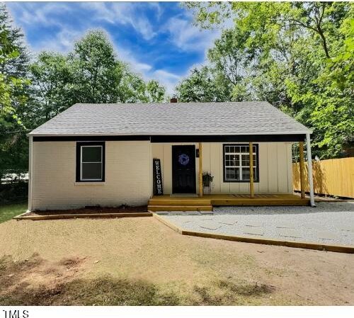 116 Lumpkin St, Raleigh, NC 27610 - view of front of house with roof with shingles and fence