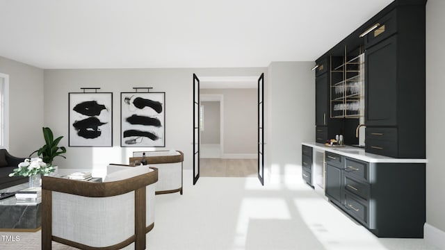 office space with bar area and baseboards