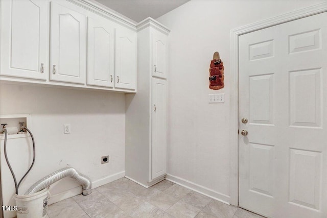 laundry room with hookup for a washing machine, electric dryer hookup, cabinet space, and baseboards