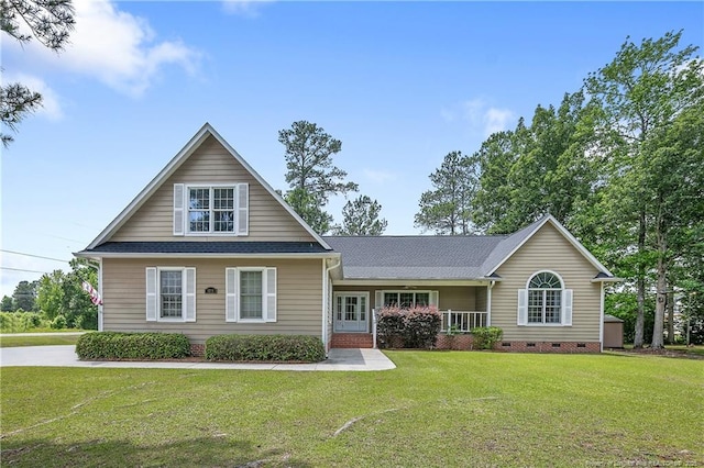 5201 Flynn Dr, Lumberton, NC 28360 - view of front facade featuring crawl space, a front lawn, a porch, and a shingled roof