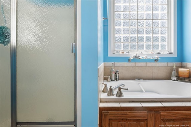 5201 Flynn Dr, Lumberton, NC 28360 - bathroom with a shower stall and a garden tub