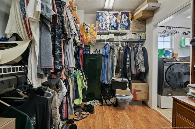 5201 Flynn Dr, Lumberton, NC 28360 - spacious closet featuring washer / dryer and wood finished floors