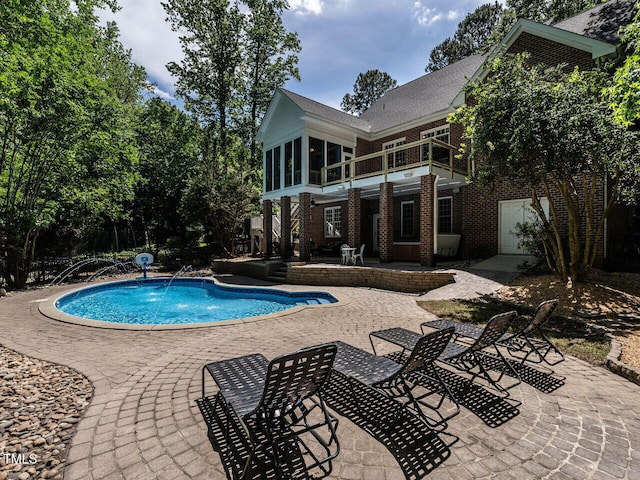 91 E Walker Woods Ln, Clayton, NC 27527 - outdoor pool with a patio and a sunroom