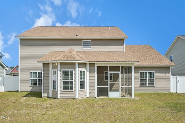 265 Wind Swept St, Raeford, NC 28376 - back of property with a sunroom and roof with shingles