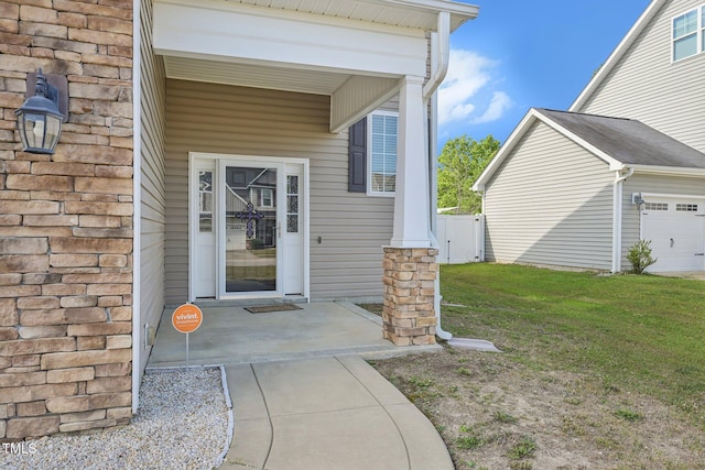 265 Wind Swept St, Raeford, NC 28376 - doorway to property with an attached garage
