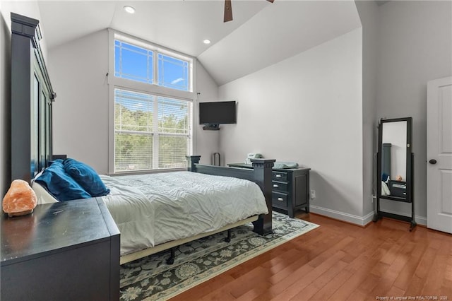 bedroom with lofted ceiling, recessed lighting, baseboards, ceiling fan, and wood finished floors