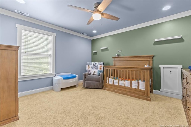 bedroom featuring ornamental molding, carpet flooring, visible vents, and baseboards