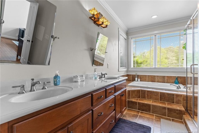 full bathroom featuring a bath, crown molding, a sink, and double vanity