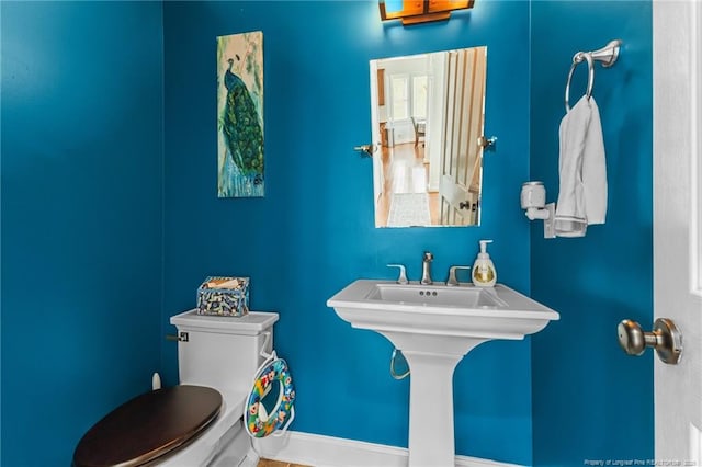 bathroom featuring toilet