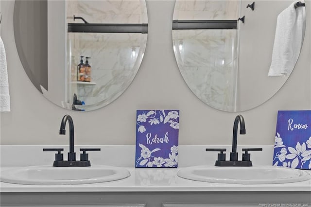 bathroom featuring double vanity