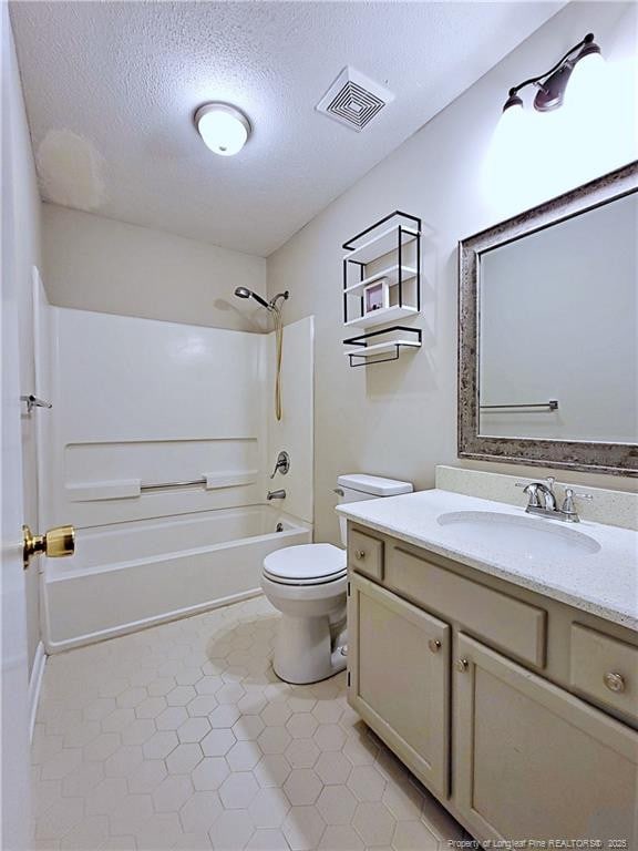 full bathroom with toilet, bathing tub / shower combination, a textured ceiling, visible vents, and vanity