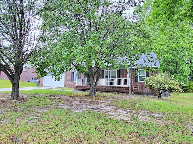 view of front of property featuring brick siding, a garage, concrete driveway, a porch, and a front lawn