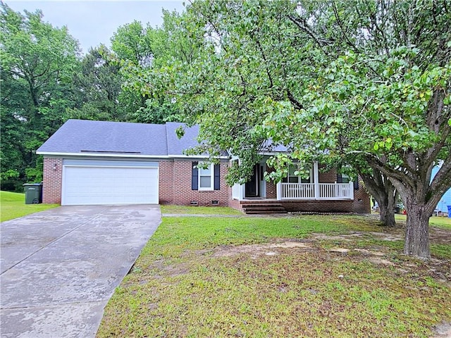 single story home featuring a front yard, brick siding, crawl space, and a garage