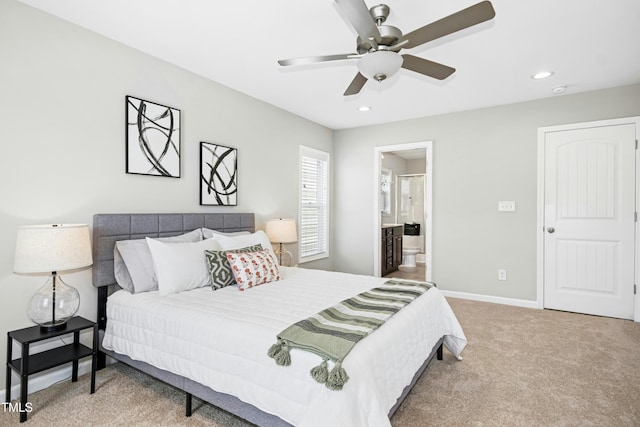 21 Diploma Dr, Clayton, NC 27520 - carpeted bedroom featuring recessed lighting, ensuite bath, a ceiling fan, and baseboards