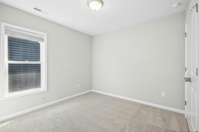 21 Diploma Dr, Clayton, NC 27520 - unfurnished room with carpet floors, baseboards, and a smoke detector