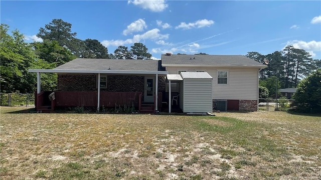 3412 Seven Mountain Dr, Fayetteville, NC 28306 - rear view of house featuring central air condition unit