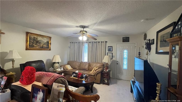 3412 Seven Mountain Dr, Fayetteville, NC 28306 - living room featuring carpet floors, a textured ceiling, and a ceiling fan