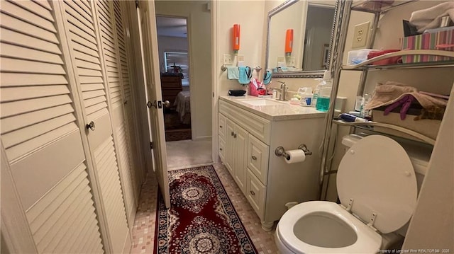 3412 Seven Mountain Dr, Fayetteville, NC 28306 - bathroom featuring vanity and toilet